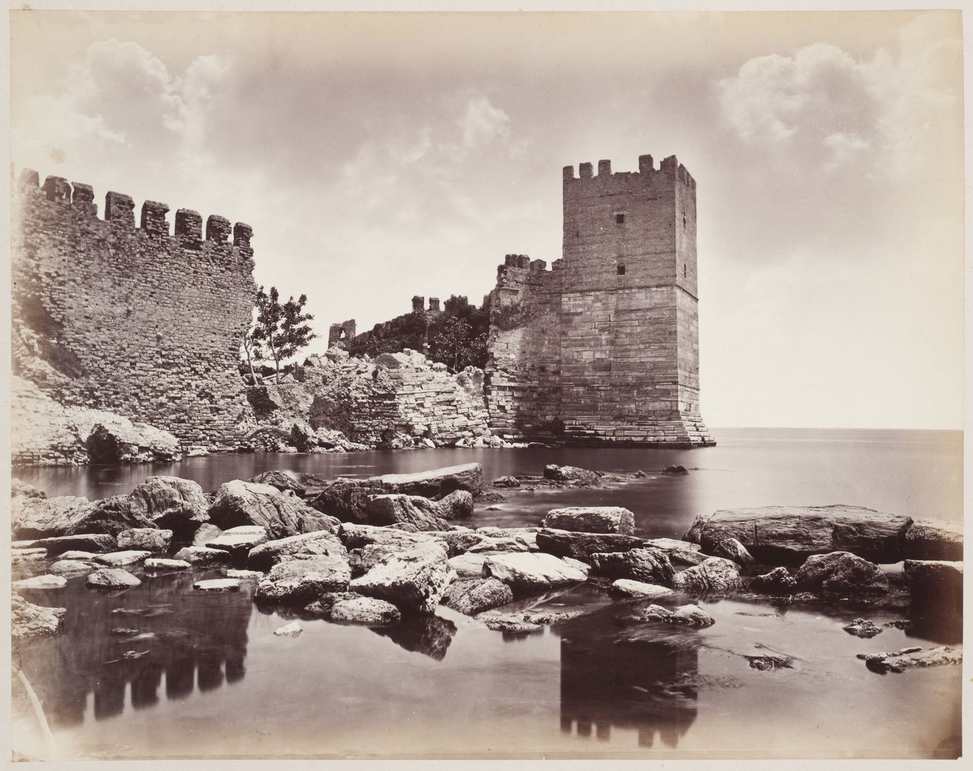 View of a section of the Theodosian Wall showing a wall tower and probably the Sea of Marmara, Constantinople (now Istanbul), Ottoman Empire (now in Turkey)