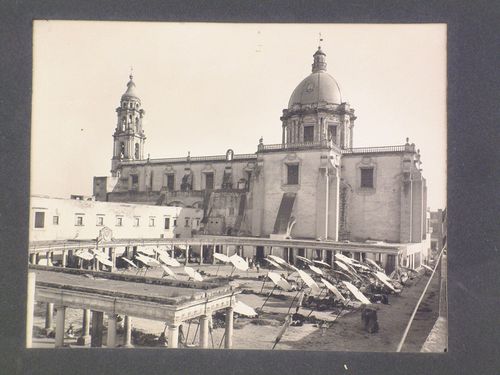 View of the market building and the Iglesia del Carmen with people in the foreground, Celaya, Mexico