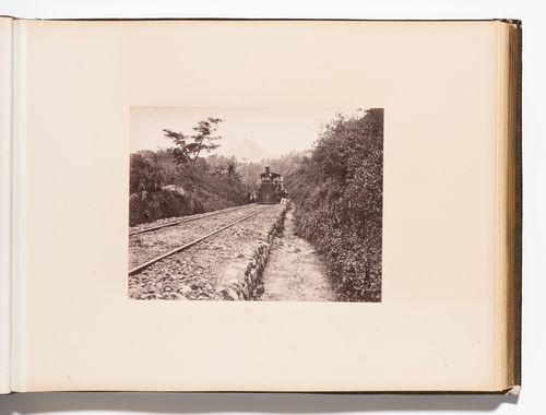 View of a locomotive on the Colombo-Kandy Railway, Ceylon (now Sri Lanka)