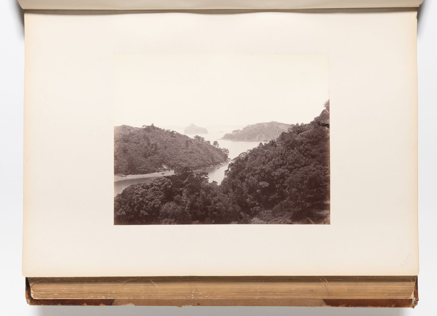 View of Takaboko Island (also known as Pappenberg Island) and the coastline near Nagasaki, Japan