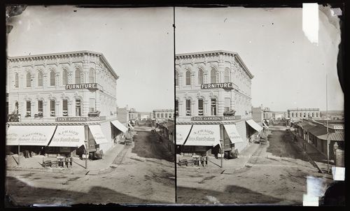 Stereograph of the C. Ducommun hardware store and the S. Prager dry good store on 204 North Main Street, Los Angeles, California, United States of America  