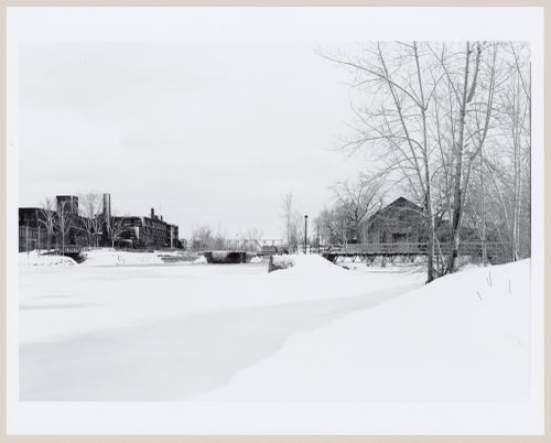 View of Lachine Canal looking west with the Belding Corticelli Spinning Mill on the left and the Caledonian Ironworks Building on the right, Montréal, Québec