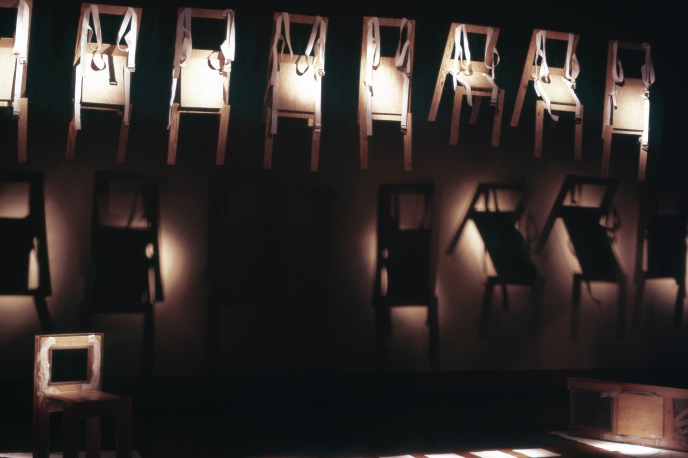 Slide of wearable chair installation at Minneapolis Institute of Art for performance Vestirsi Di Siede