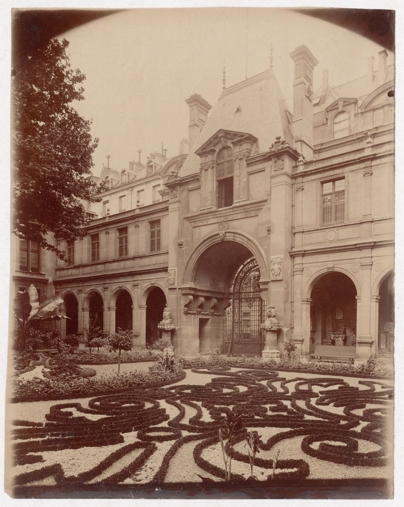 Garden of the Musée Carnavalet, rue des Francs-Boigeois, looking toward the 16th century arch of Nazareth, from the north, Paris, France