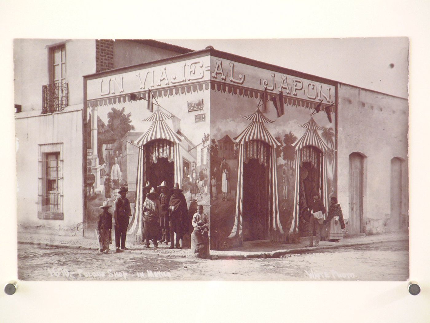 Pulque Shop on corner, with figures out front, Mexico