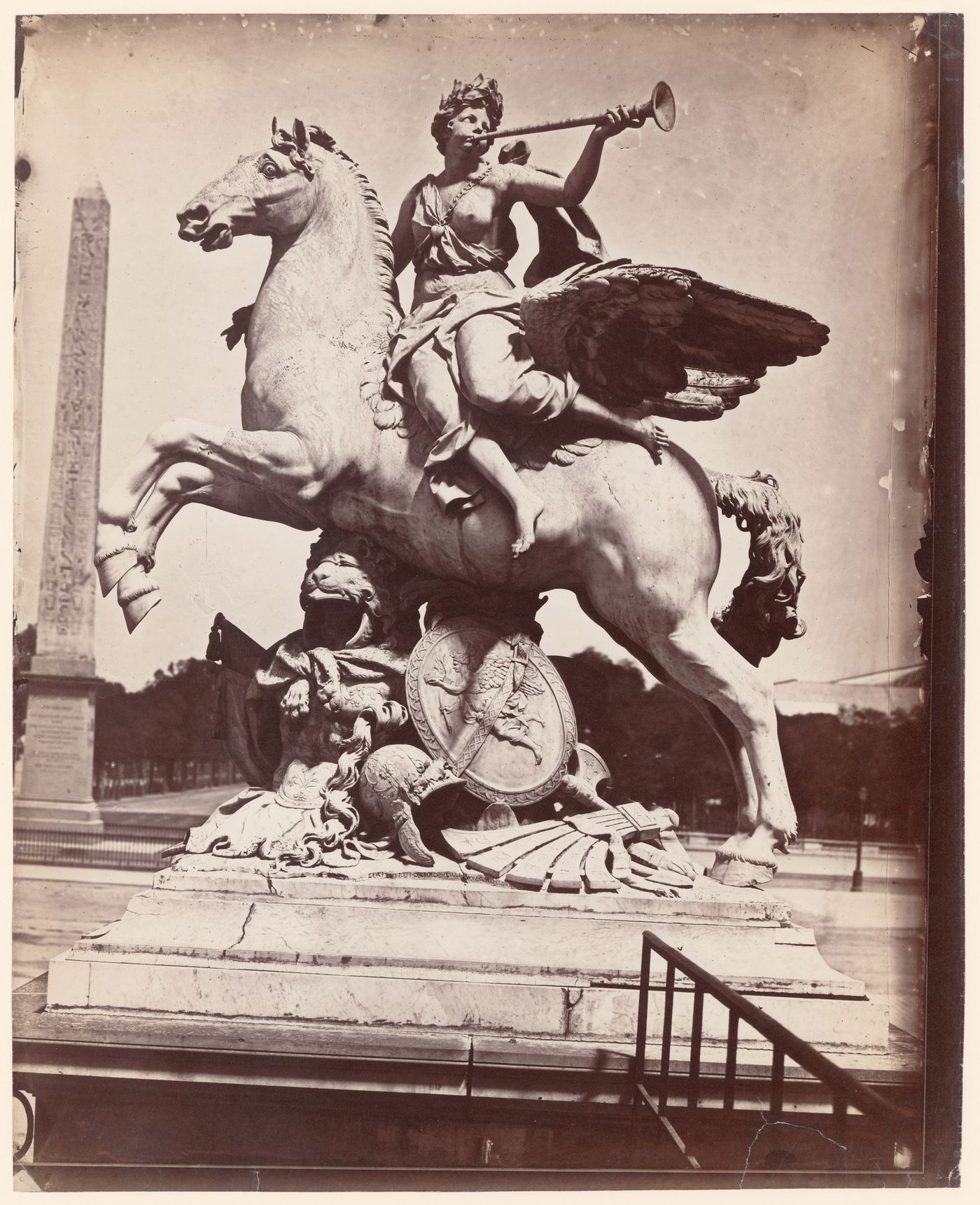 Entrance to Tuileries Garden from Place de la Concorde, Coysevox's La Renommée chevauchant Pégase, with the Luxor obelisque behind, Paris, France