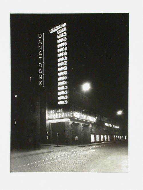 Illuminated night view of Städtische Sparkasse, Germany