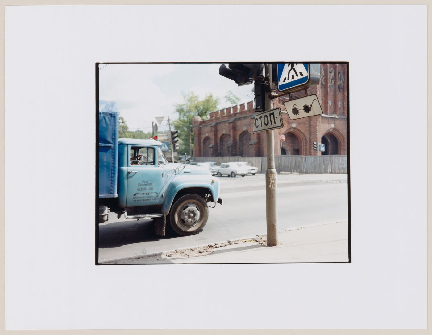 View of a truck, a street, a traffic signal and a building, Kaliningrad, Kaliningradskaia oblast', Russia (from the series "In between cities")