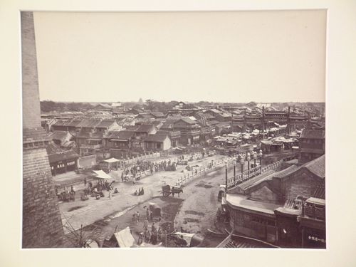 View of the Beggars' Bridge from the top of the city wall showing the Chinese City, Peking (now Beijing), China