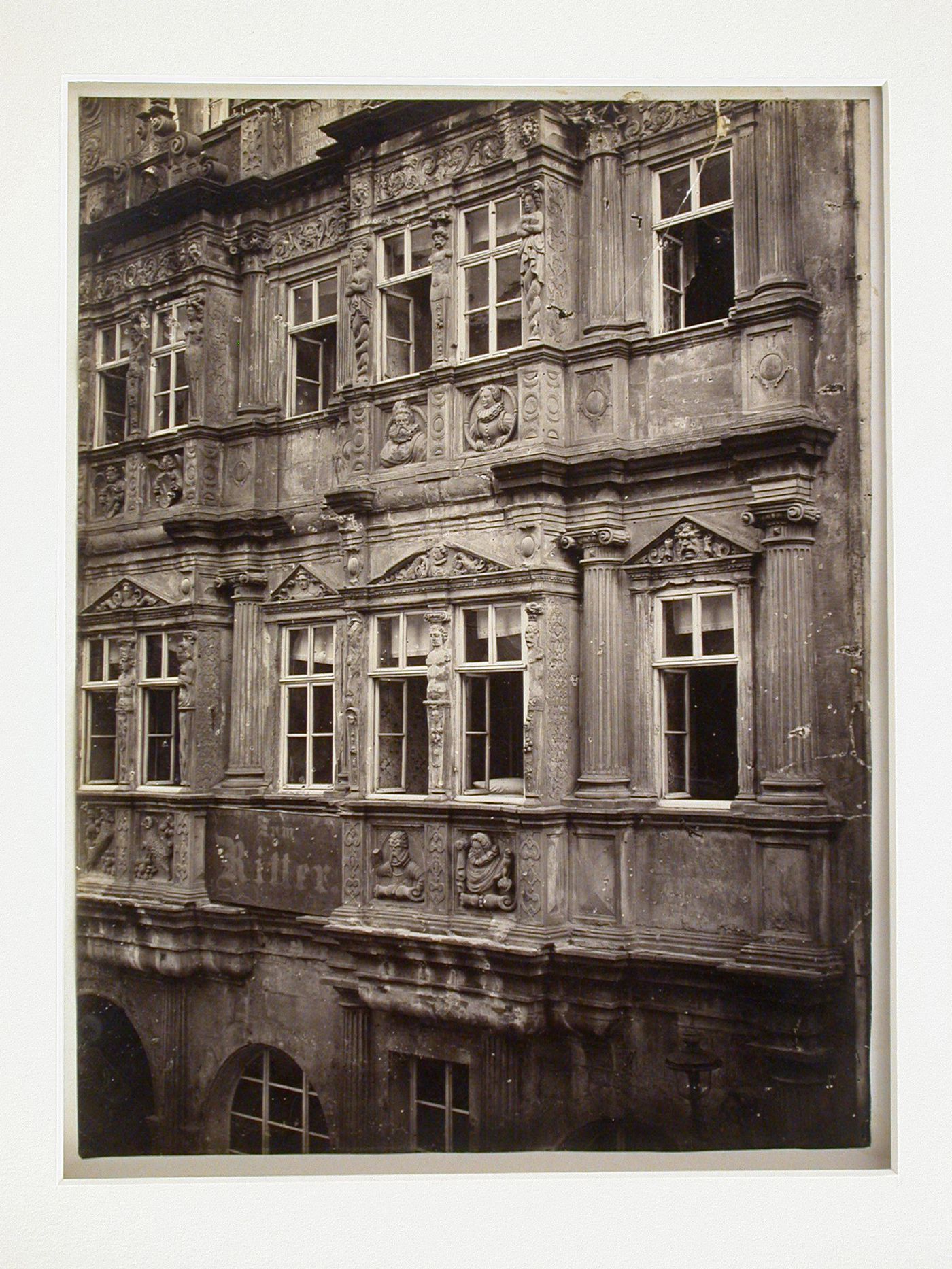 Detail for windows and reliefs, façade of large building, Hamburg, Germany