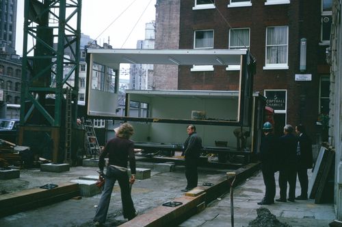 McAppy: view of portable enclosure being lowered onto the Angel Court site at 9:35am