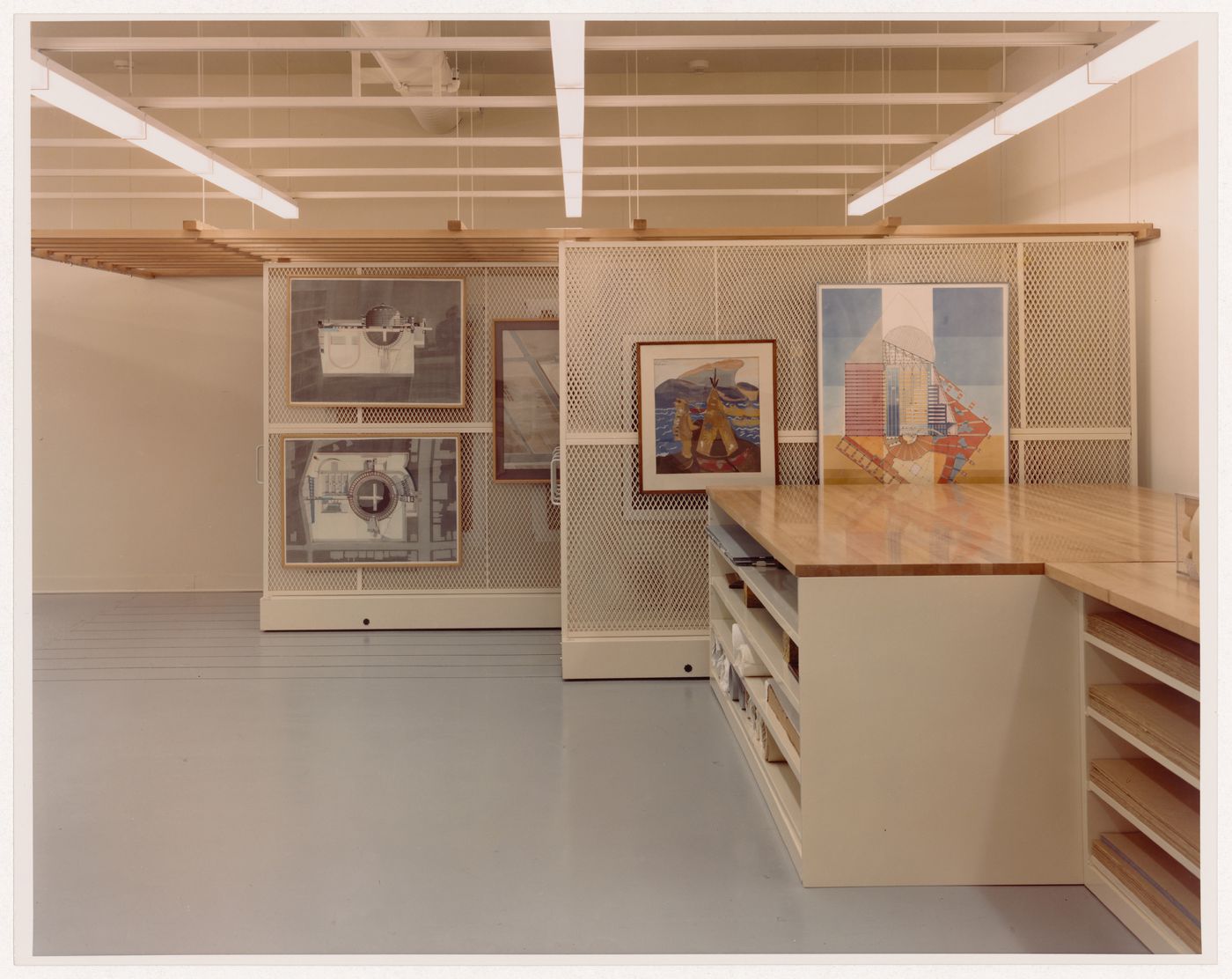 Interior view of the Prints and Drawings Collection storage vault on level 2 showing presentation drawings hung on storage racks, Canadian Centre for Architecture, Montréal, Québec
