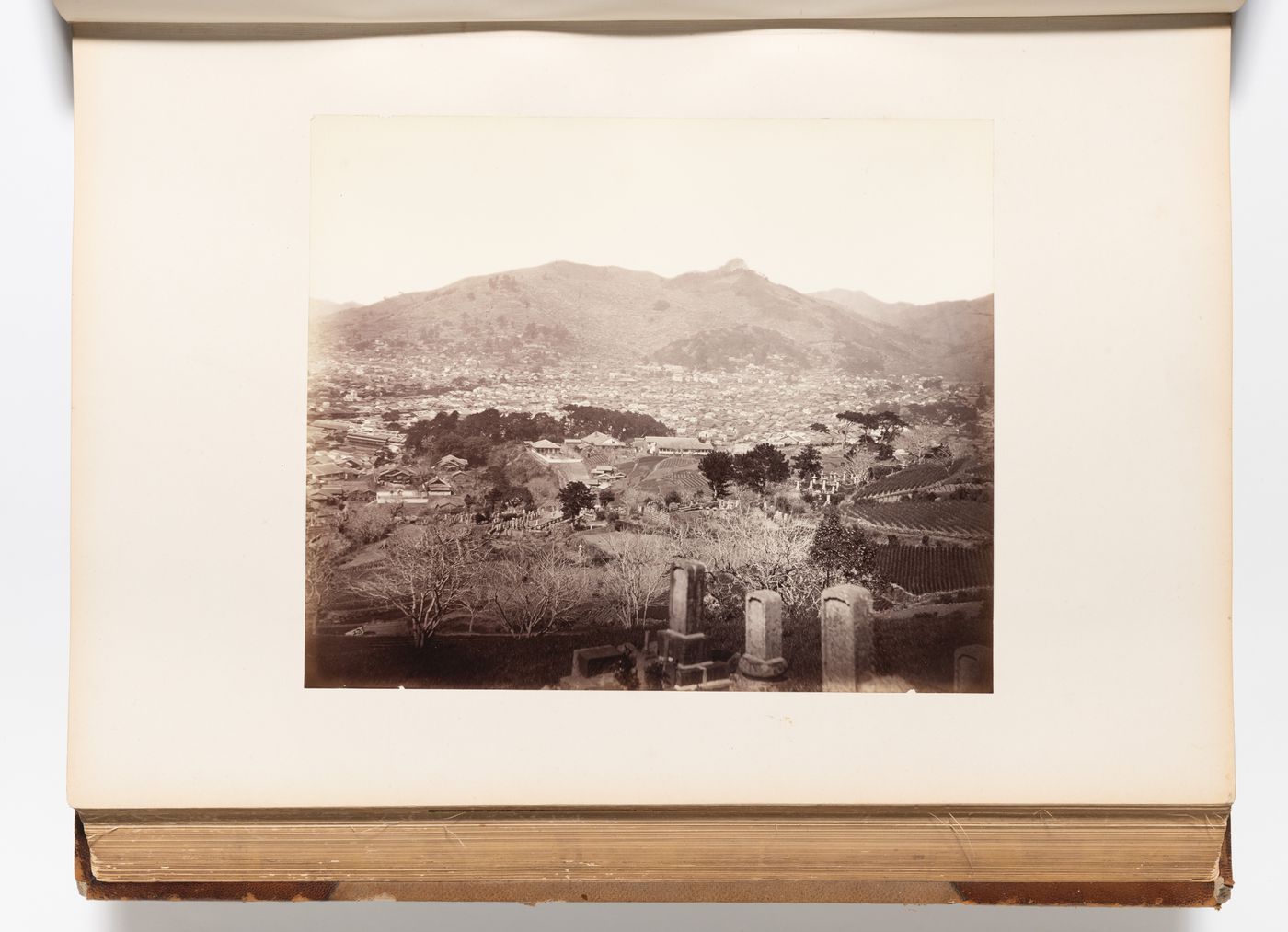 Panoramic view of the city showing the Nagasaki Youjou-Sho hospital and a cemetery, Nagasaki, Japan