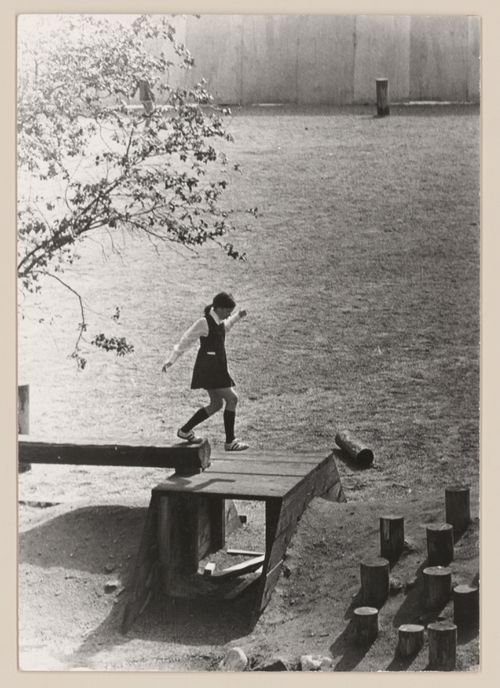 View of child playing in Talmud Torah School Playground, Vancouver, British Columbia
