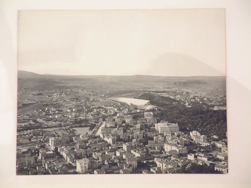 Aerial view of an unidentified city with a stadium