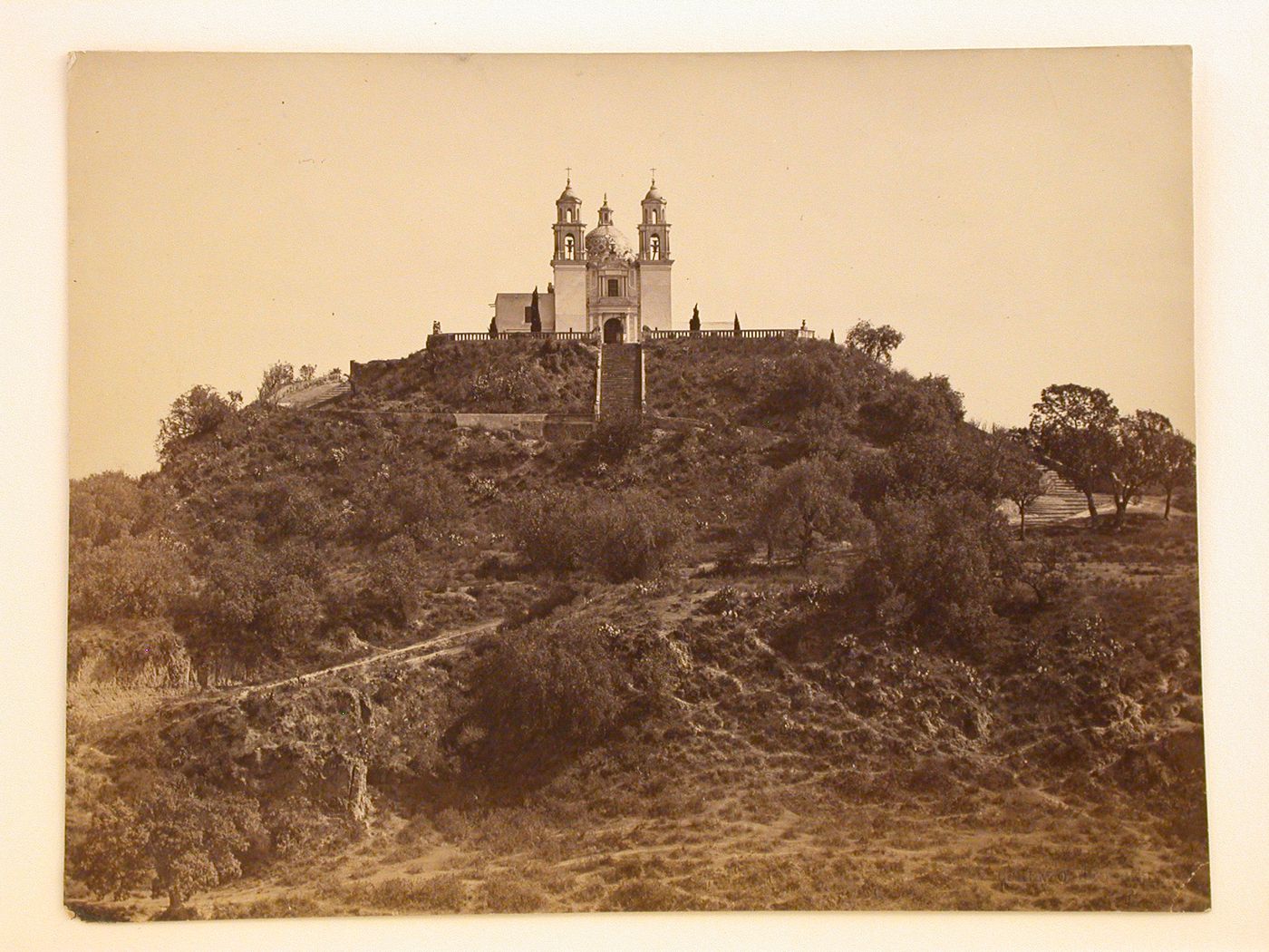 View of the Church of Nuestra Señora de los Remedios on the summit of the ruins of the Great Pyramid of Tepanapa, Cholula, Mexico
