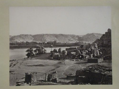 View of the Nile, looking East across river, with Nile sructures in foreground, Bigah Island [?], Egypt