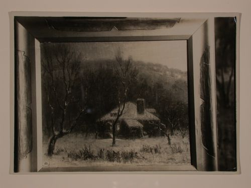Photograph of a painting of a house in winter