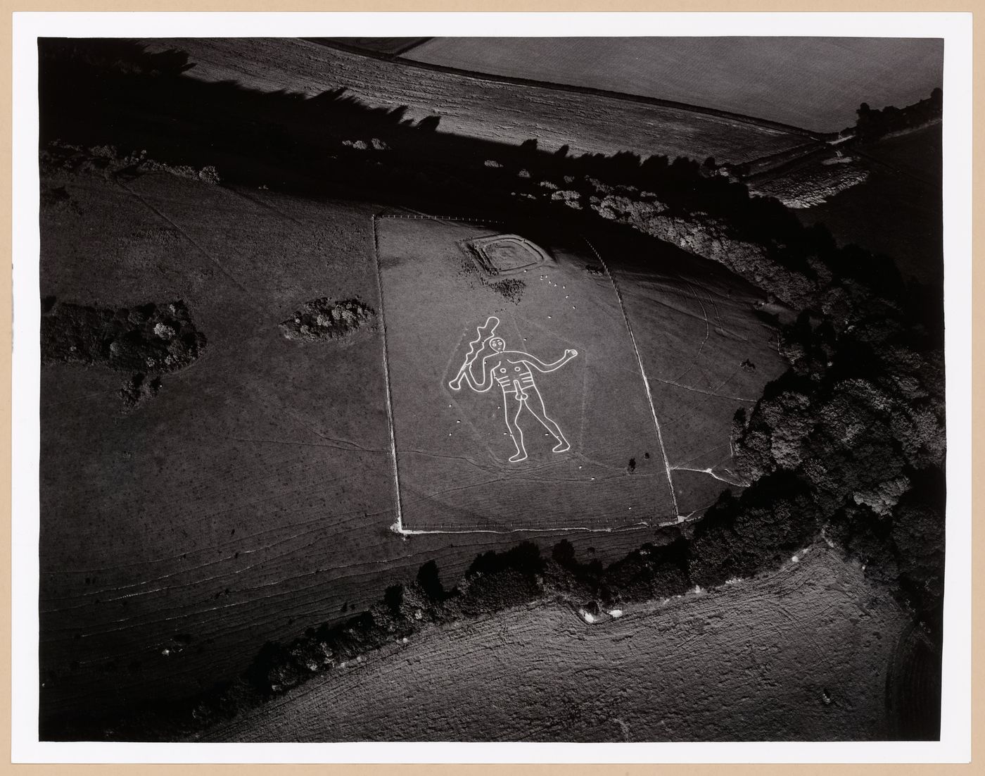 Aerial view of the Cerne Abbas Giant and showing the Trendle, Cerne Abbas, Dorset, England
