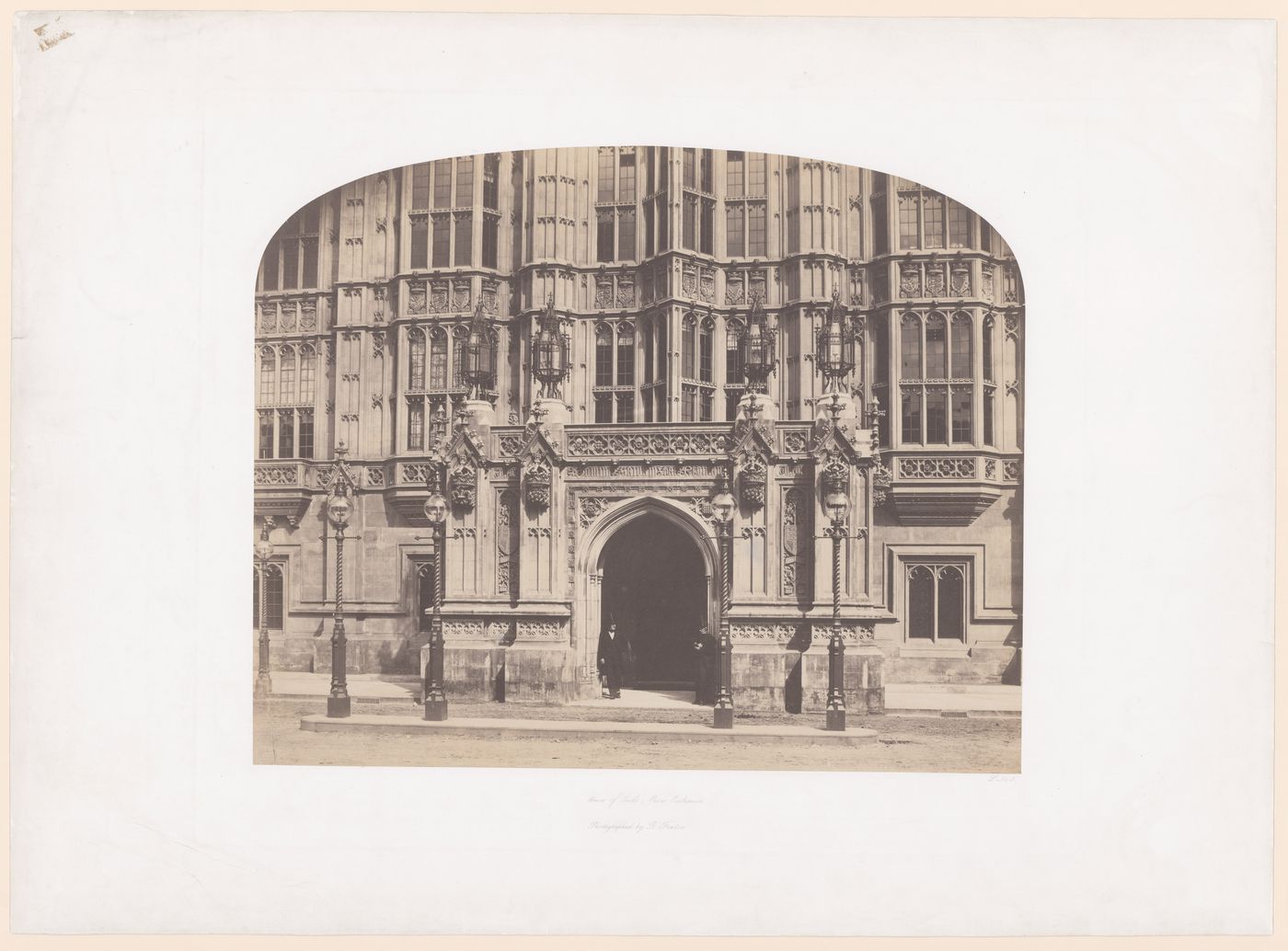 House of Lords, Peers Entrance, with two top-hatted men in doorway, London, England