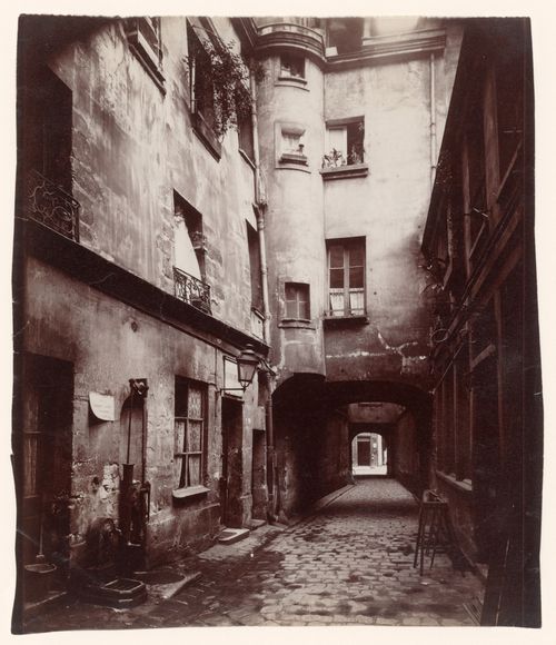 56 Rue de la Verriere, building with arched section over street, Paris, France