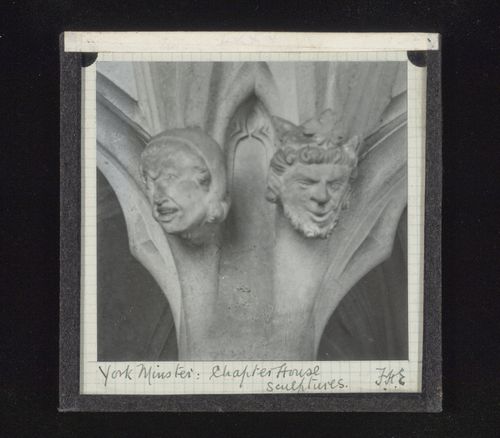 View of two sculptures of heads in Chapter House of York Minster, York, North Yorkshire, England