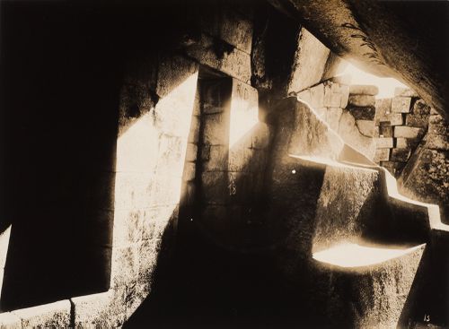 Interior view of the Royal Mausoleum showing the entrance stonework below the Torreón, Machu Picchu, Peru