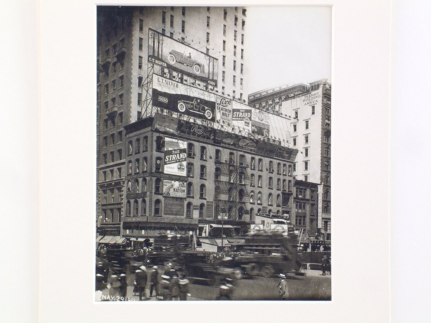 Fifth Avenue and 42nd Street, blurred cars and pedestrians, New York City, New York