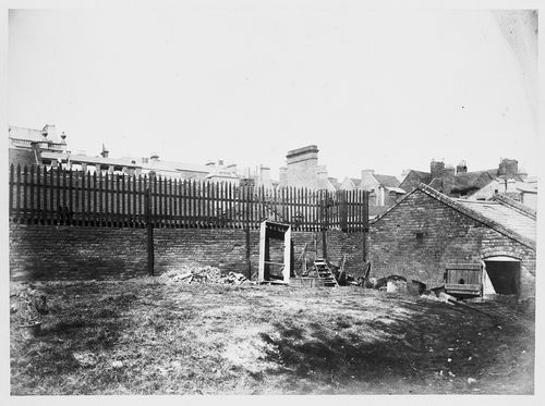 View of back garden, other houses visible beyond wall, Birmingham, England