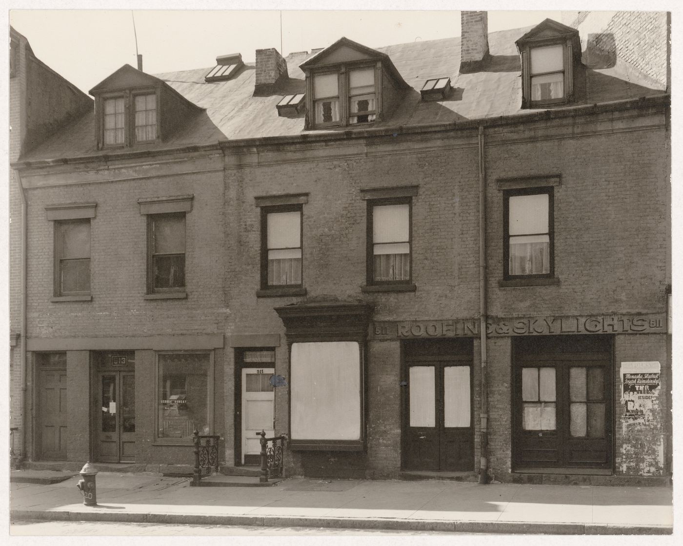 Façade of No. 511-513 Grand Street, New York City, New York