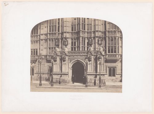 House of Lords, Peers Entrance, with two top-hatted men in doorway, London, England