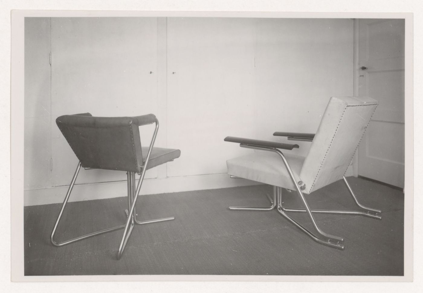 View of elbow chairs designed by J.J.P. Oud for Metz & Co., Amsterdam, Netherlands