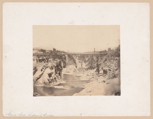 View of the Grand Falls suspension bridge in winter, Saint John River, near Colebrooke (now Grand Falls or Grand-Sault), New Brunswick