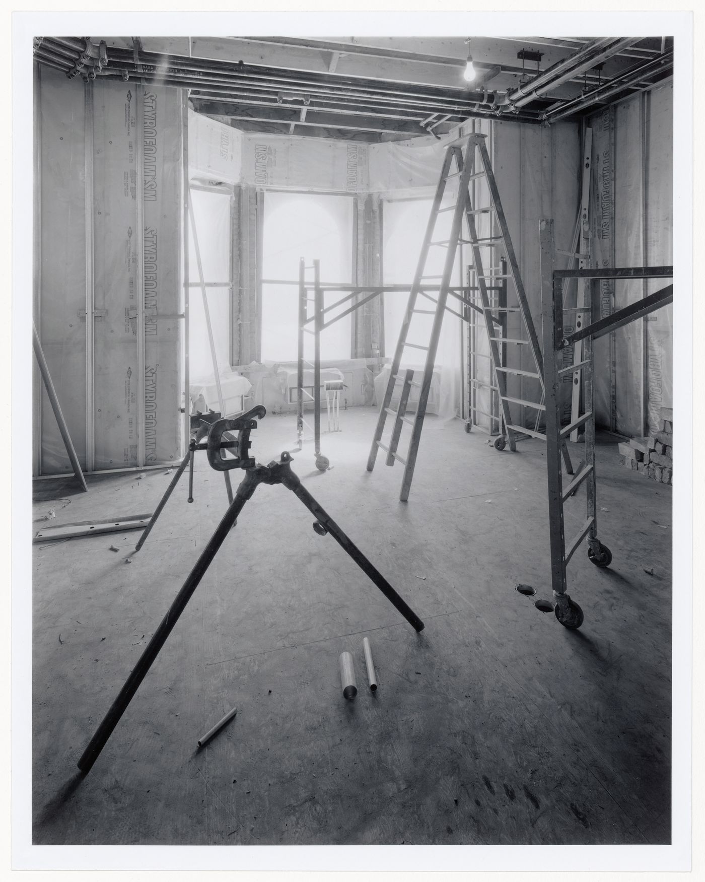 Interior view of the Director's office showing a bay window, Shaughnessy House under renovation, Montréal, Québec
