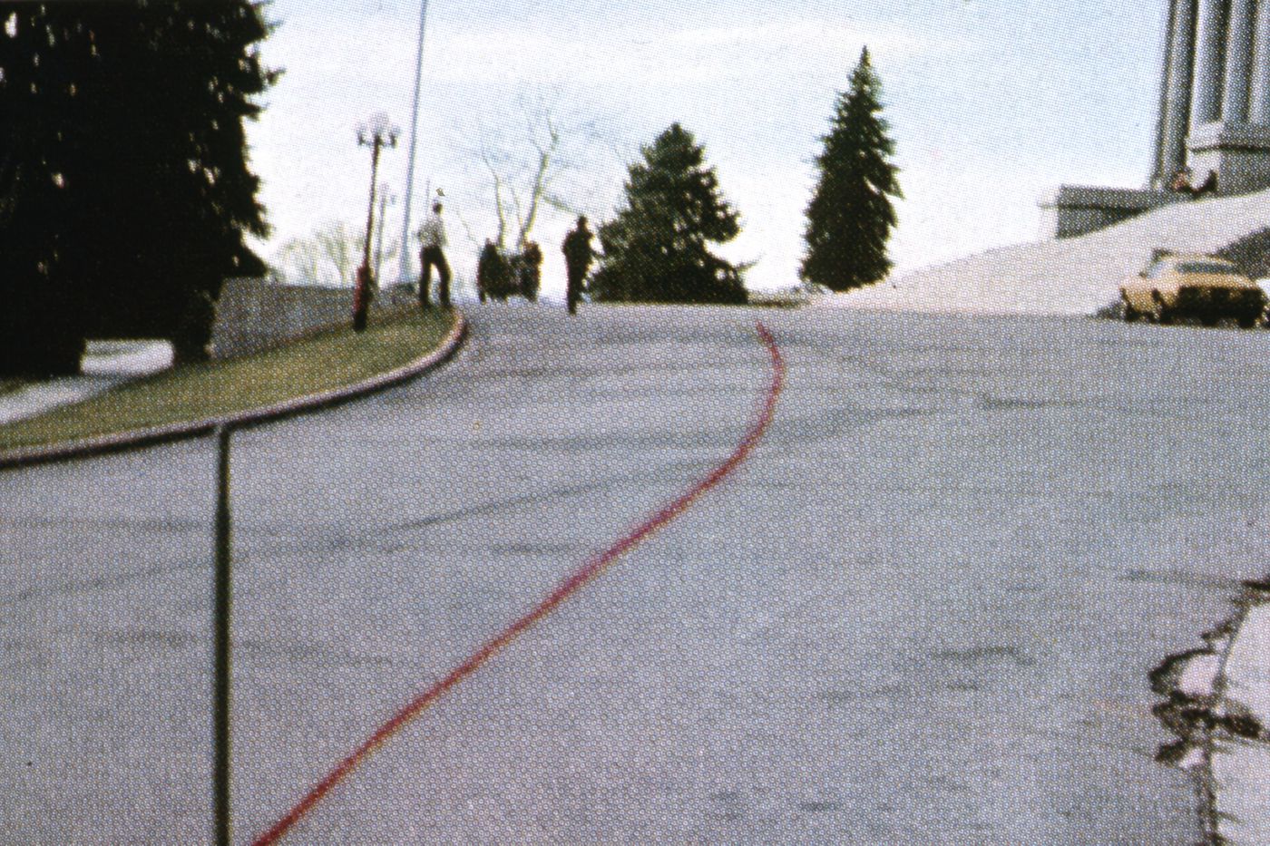 Slide showing line on road for Red Line