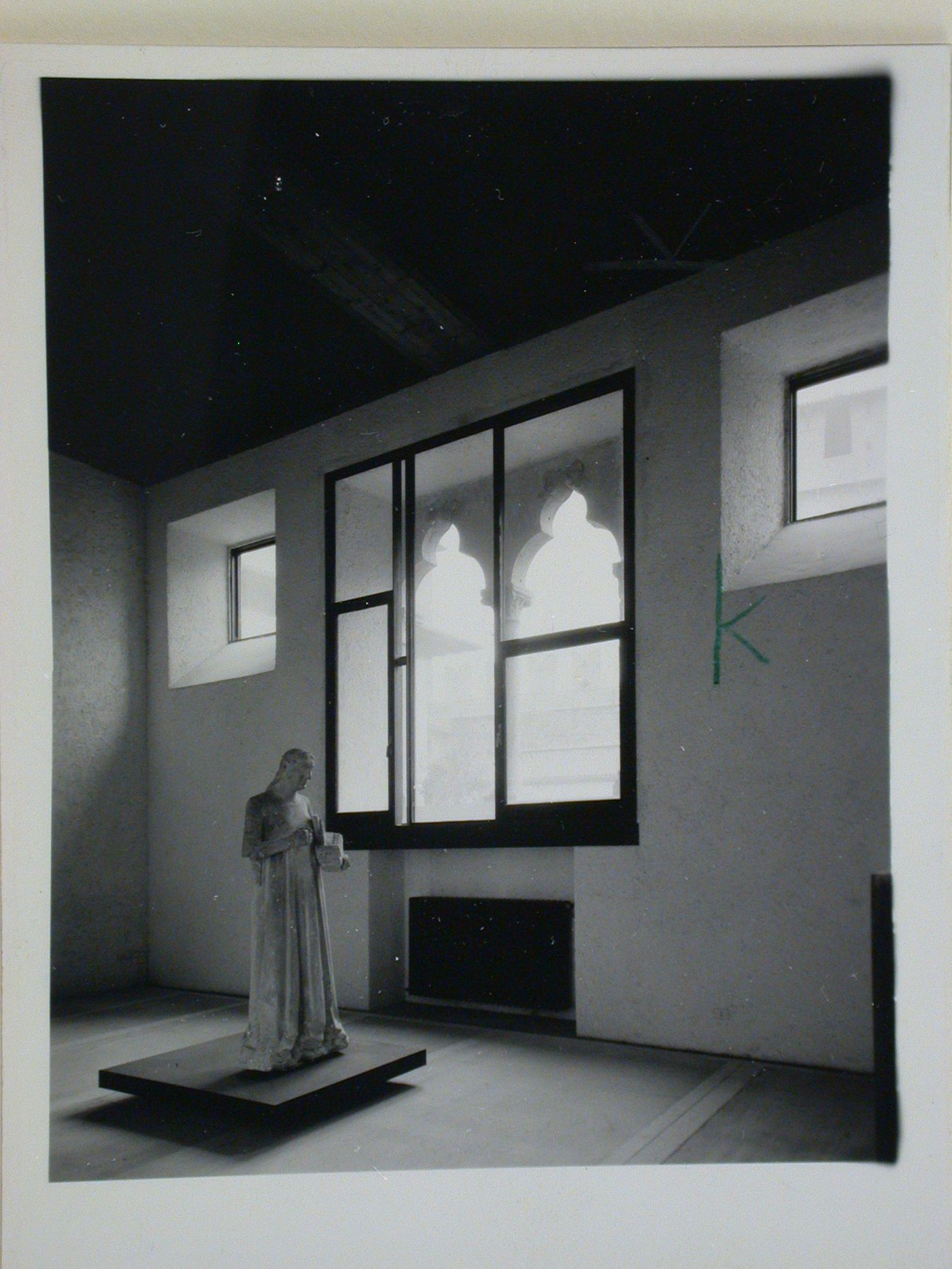 Interior view of a gallery showing a statue and windows, Museo di Castelvecchio, Verona, Italy