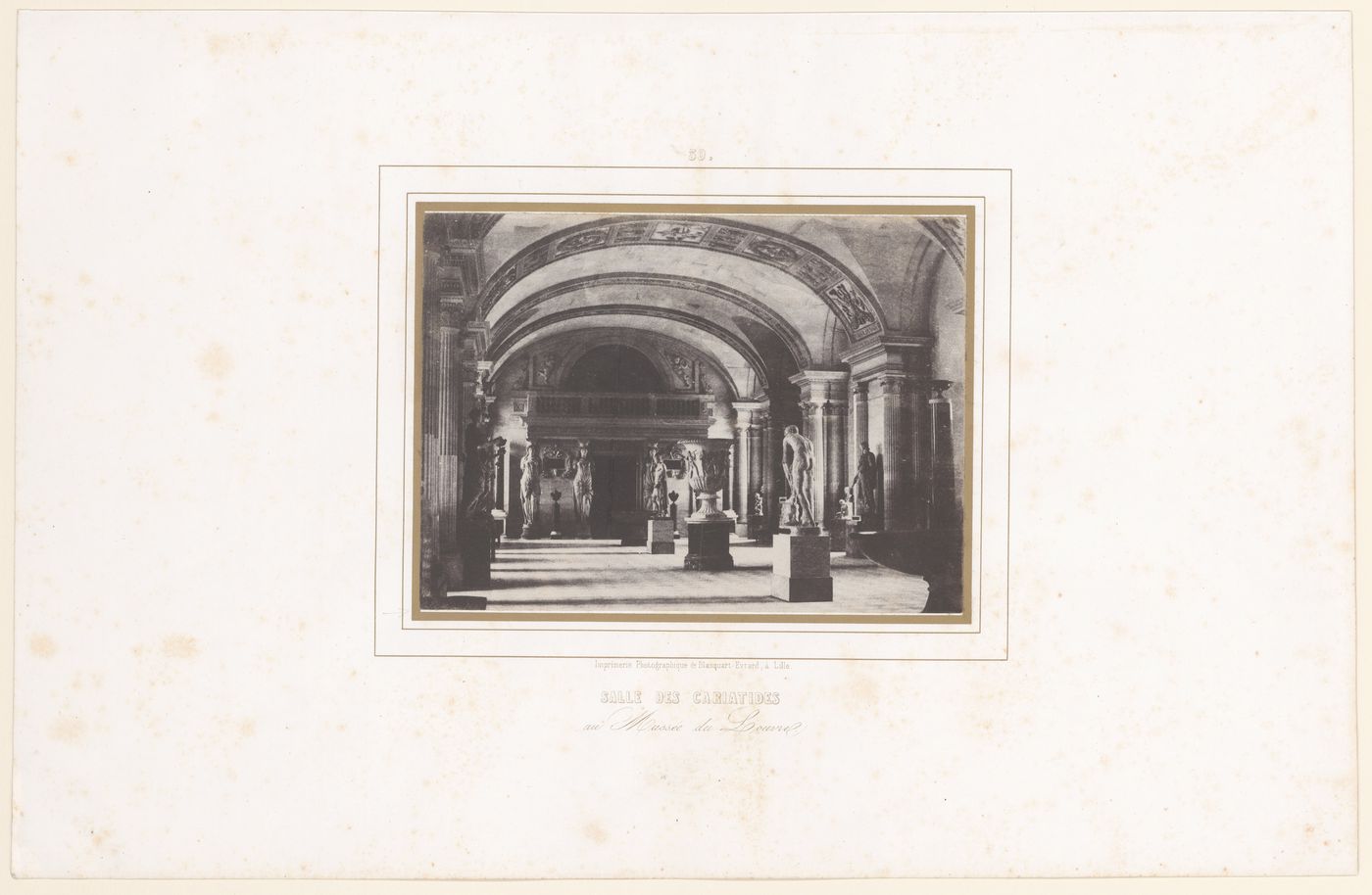 Interior view of Salle des Cariatides, Musée du Louvre, and sculpture, Paris, France