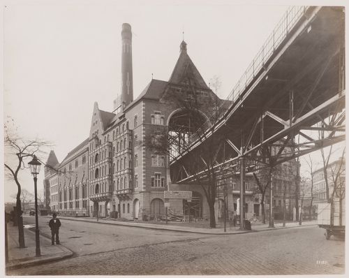 Worm's-eye view of the elevated railway system and connecting building