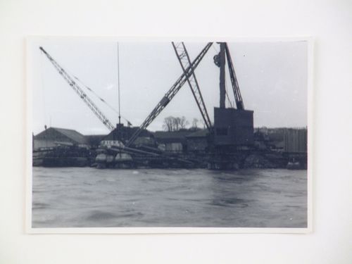 View of cranes used for construction of Barnstaple Long Bridge, Devon, United Kingdom