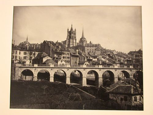 General view of town, with elevated roadway or promenade and garden in foreground, Lausanne, Switzerland