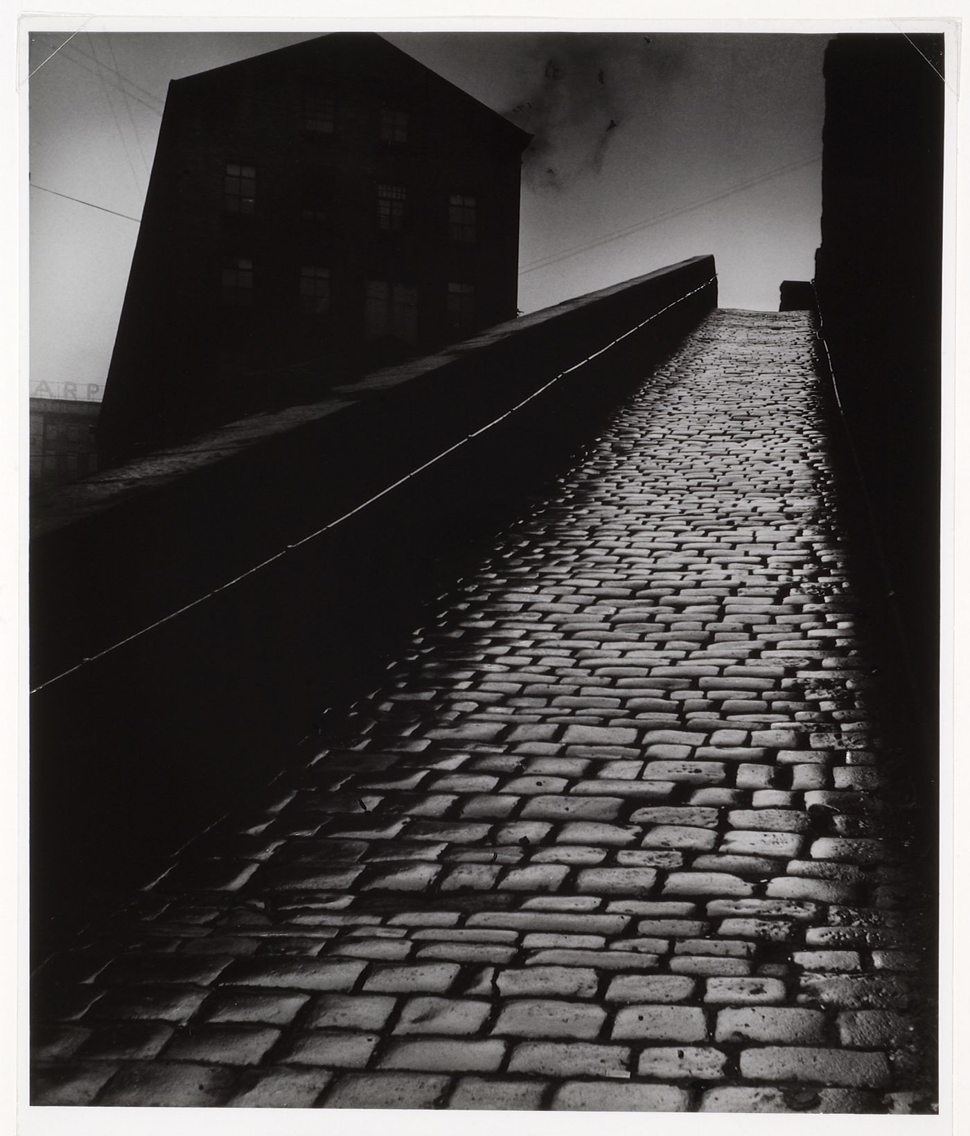 View of a cobble-stoned snicket (steep narrow path), Halifax, England