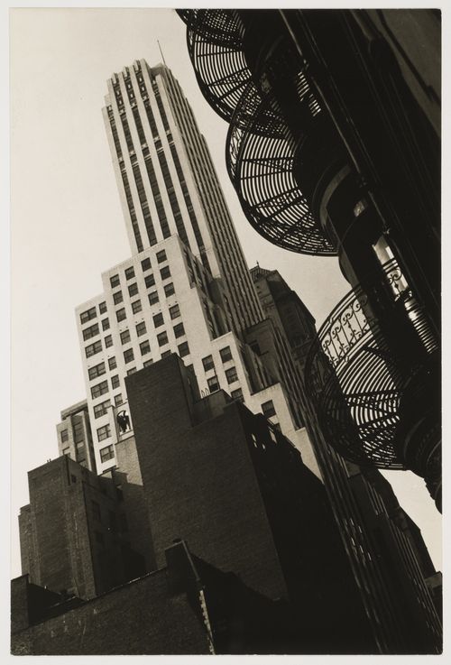 Abstract view of two buildings, one with spiral fire escape, New York City, New York