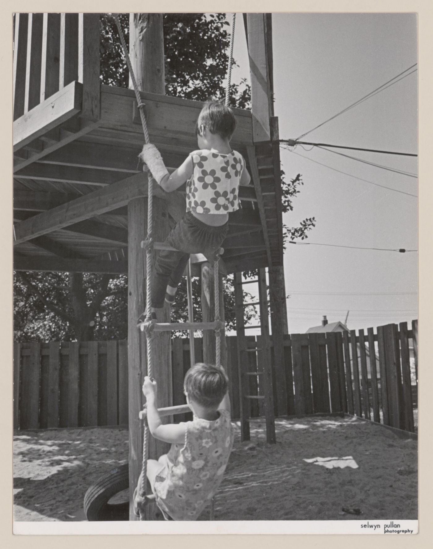 View of children playing in North Shore Neighbourhood House Playground, Vancouver, British Columbia