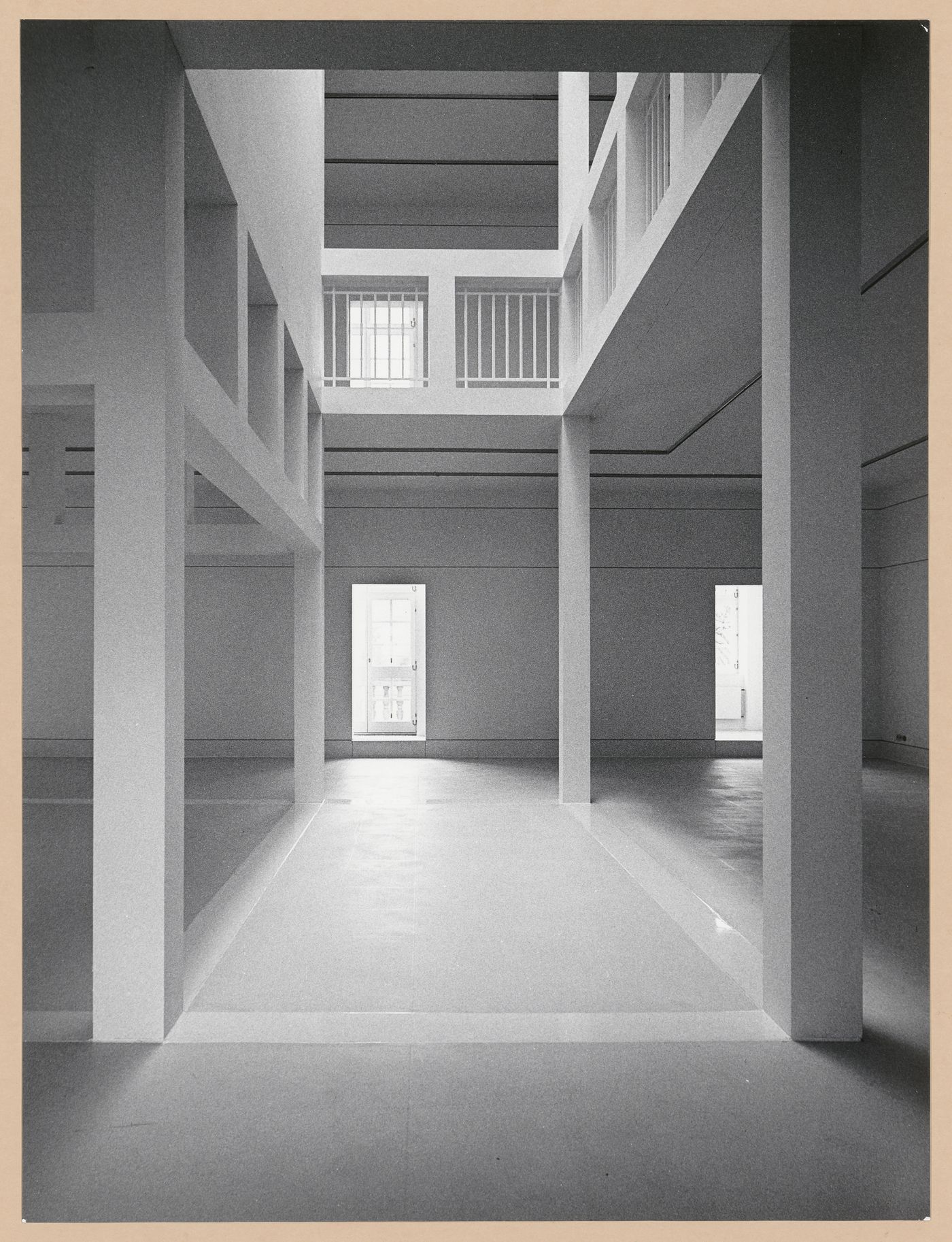 Interior view of the Deutsches Architekturmuseum [German Architecture Museum] showing the third level with the girders of the first storey of the House-in-House on the left, a light well and exhibition areas, Schaumainkai 43, Frankfurt am Main, Germany