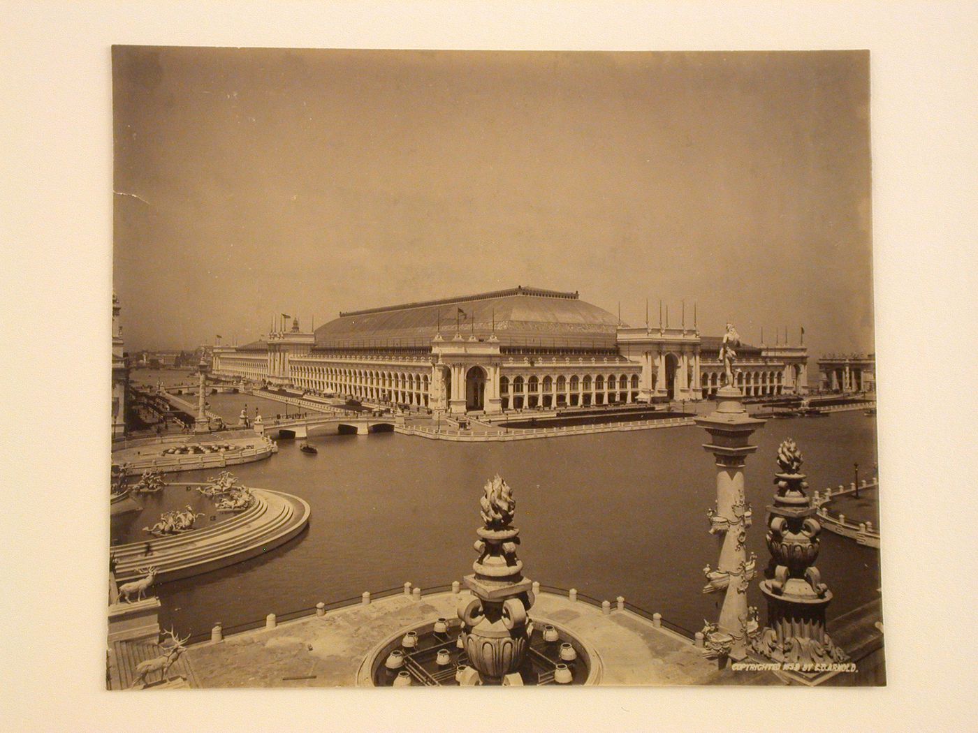 View of the south and west façades of the Manufactures and Liberal Arts Building from the roof of the Machinery Hall with the Columbian Fountain on the left and Grand Basin in the foreground, 1893 Chicago World's Columbian Exhibition, Chicago, Illinois