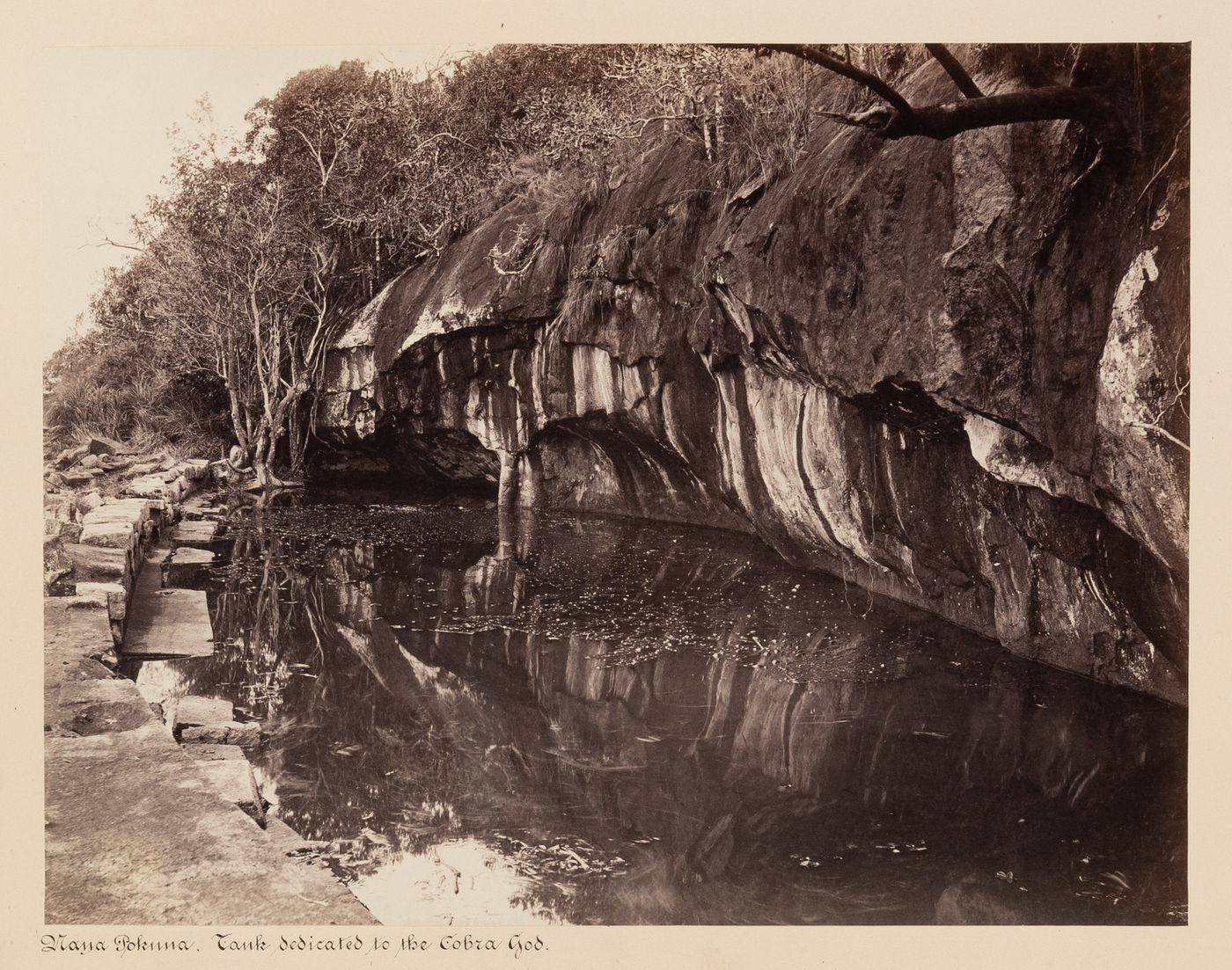View of the Naga Pokuna (also known as the snake bathing pool and the Cobra Pond), Mihintale, Ceylon (now Sri Lanka)