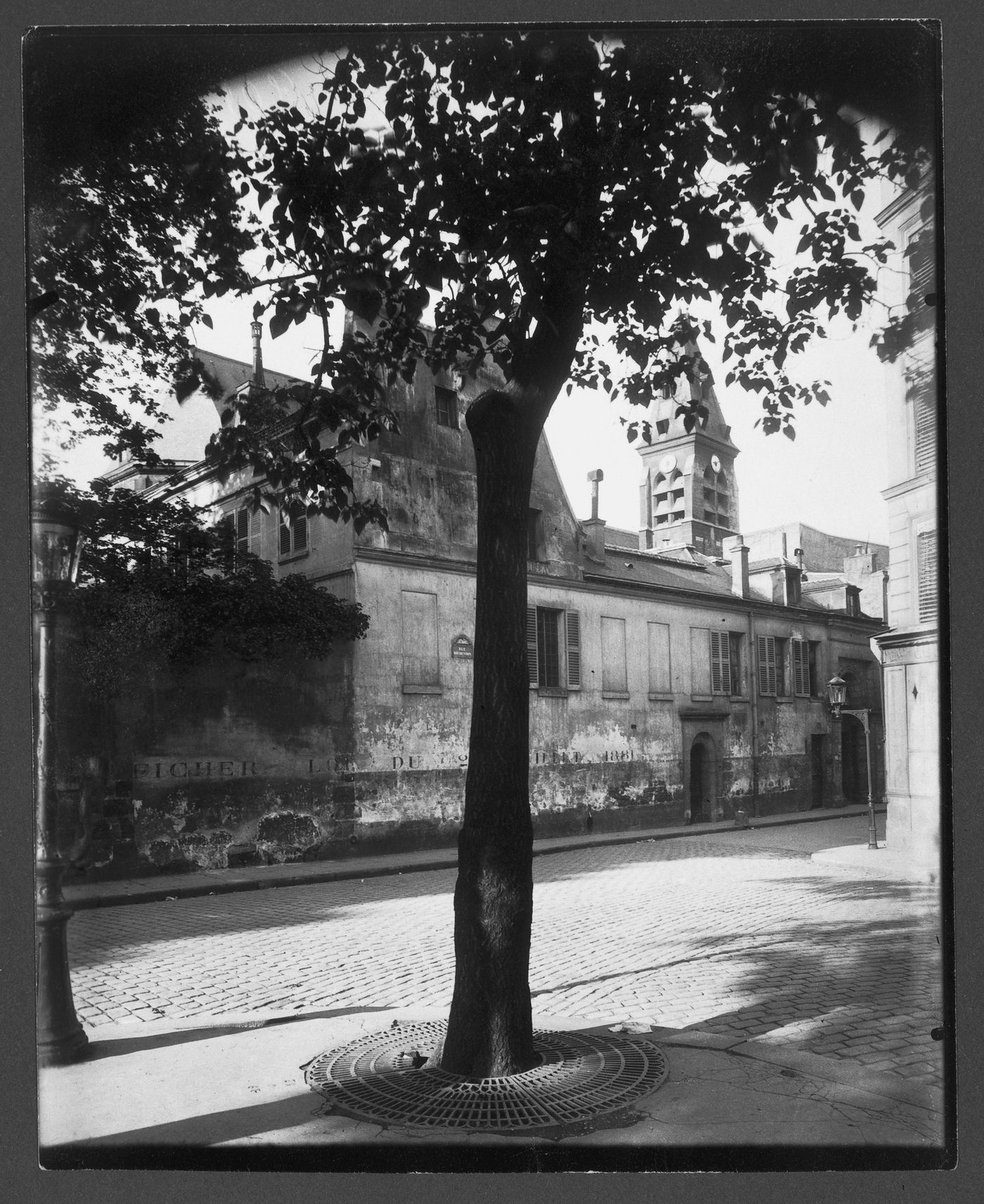 Rue Daubenton, with belfry of Église de Saint Médard in background, Paris, France