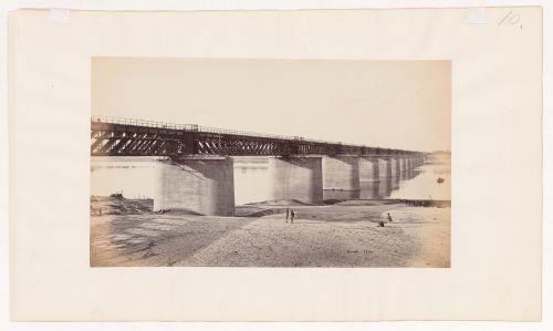 View of a railroad bridge, possibly known as the Papaman Bridge, over the Yamuna River (also known as the Jumna River), Allahabad, India