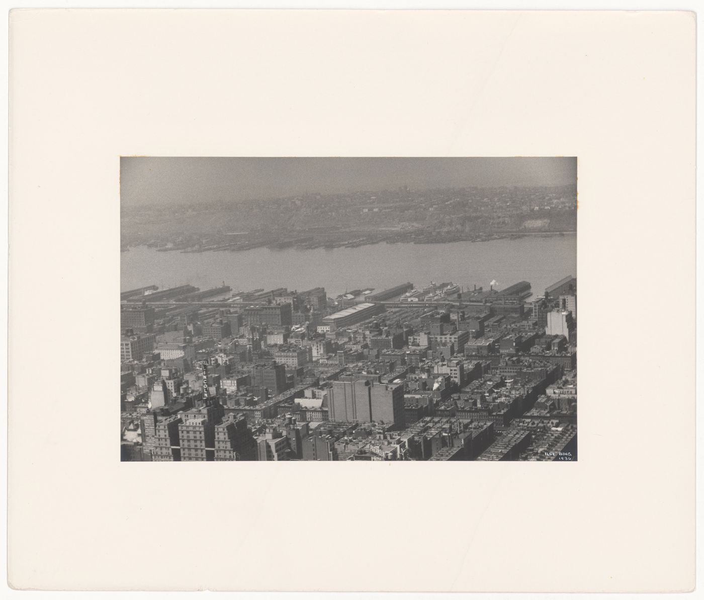 Aerial view of Manhattan showing the Chrysler Building and other skyscrapers and the East River, New York City, New York