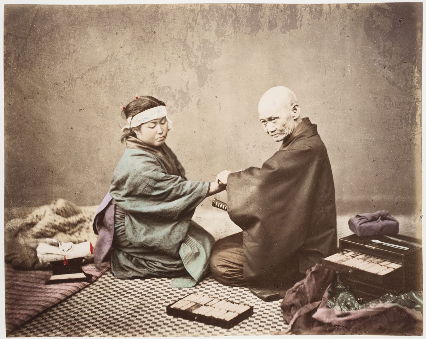 Group portrait of a patient and a physician, Japan